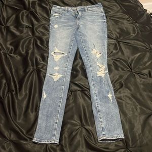 stretchy ripped light wash american eagle jeans